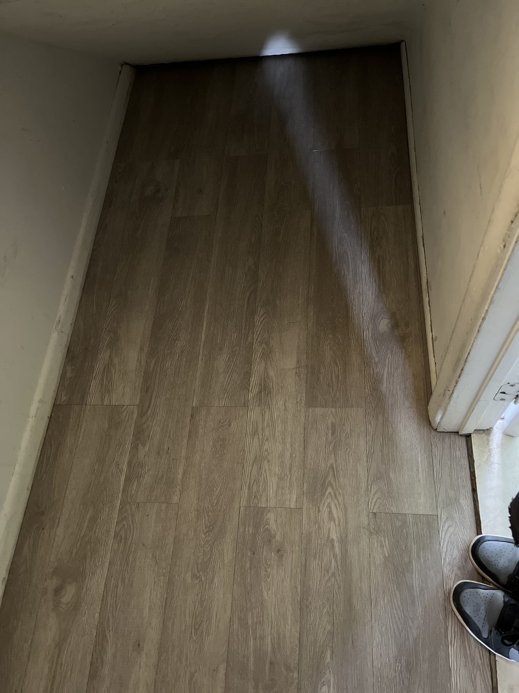 Finished laminate wood-look flooring installation