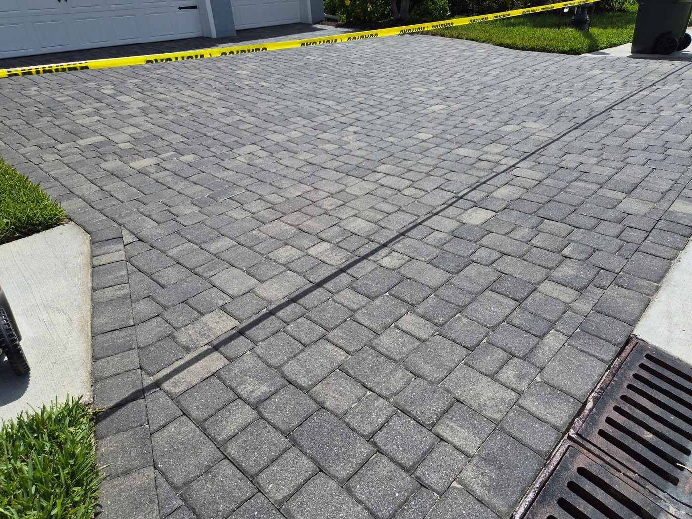 Faded paver driveway before cleaning in Sarasota County