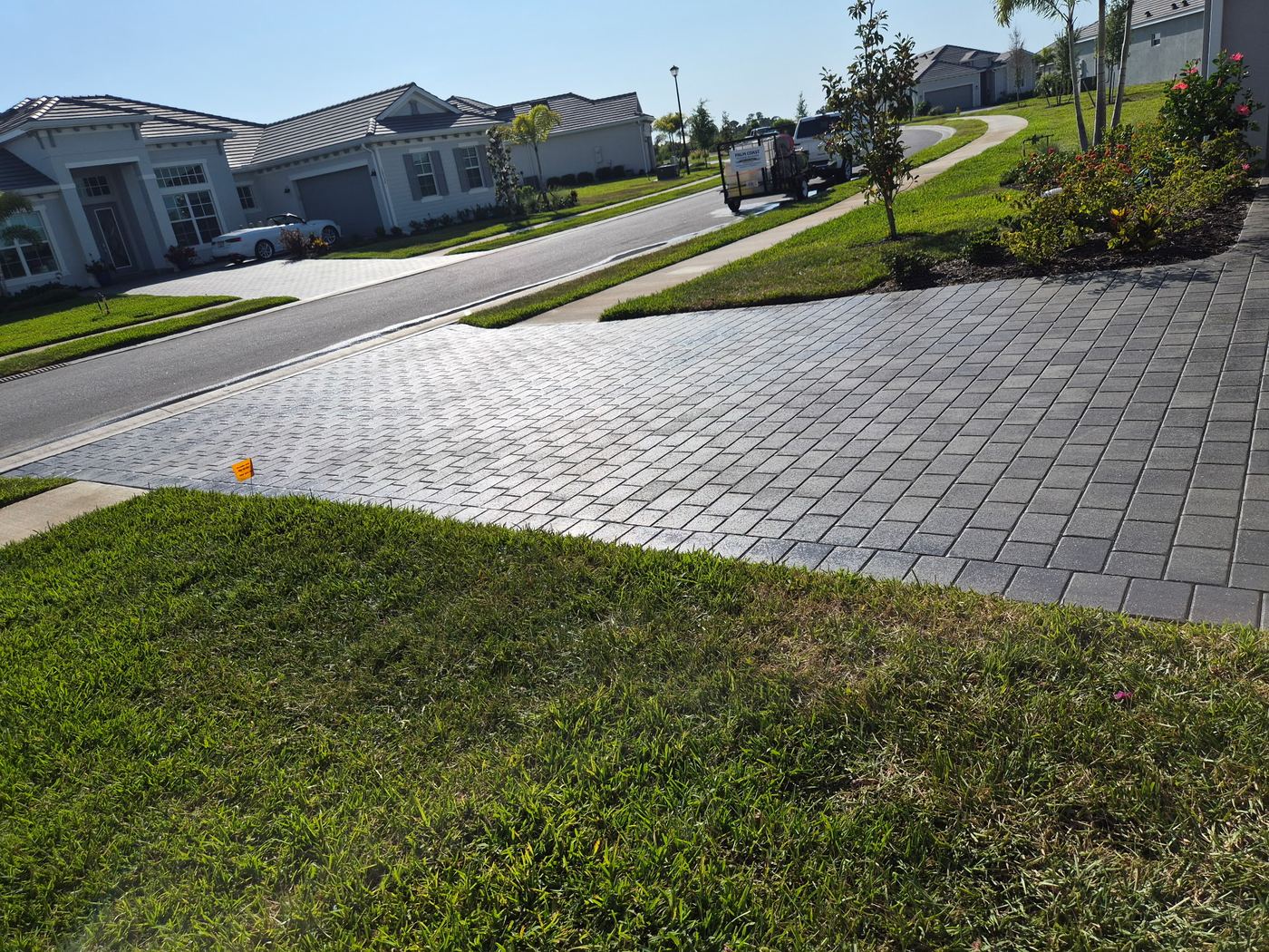 Paver sealing job in progress in a Sarasota FL neighborhood