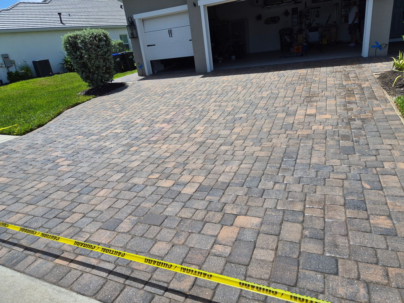 Freshly sealed driveway pavers in Manatee County FL