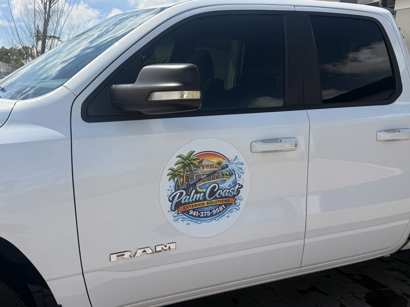 Palm Coast Exterior Solutions branded work truck serving Sarasota and Manatee County FL